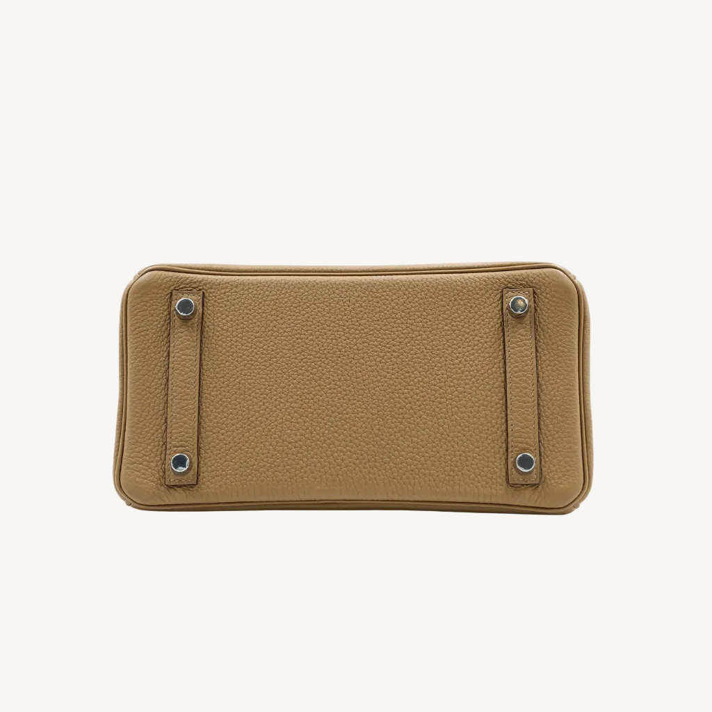 Brown leather wallet with metal clasps on a white background