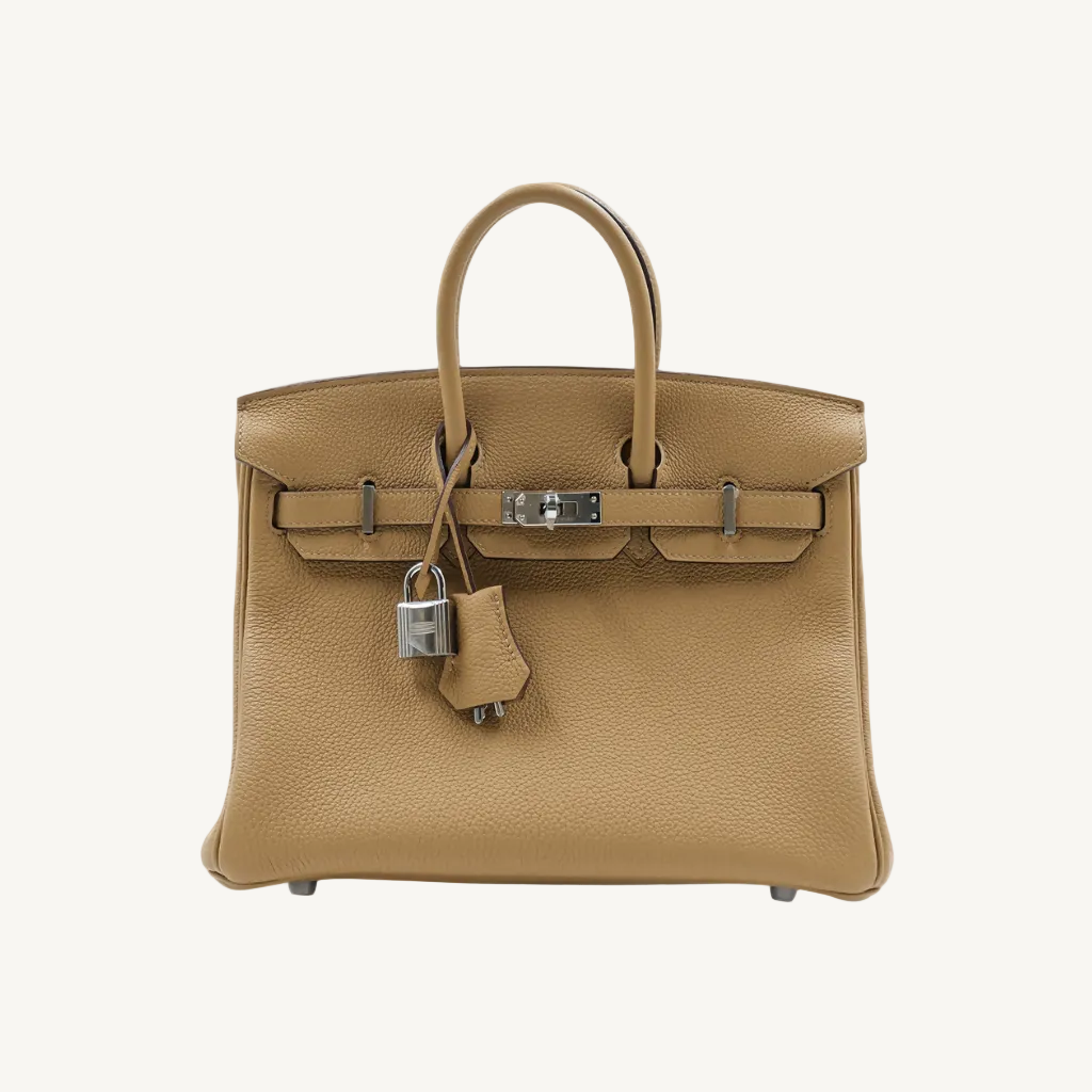 Beige handbag with silver hardware on a white background