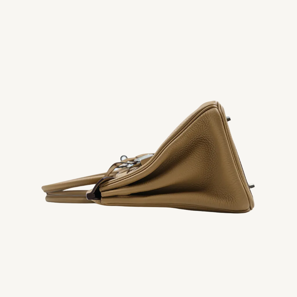 Tan handbag on a white background